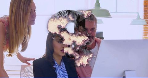 Business team collaborating at desktop with smoky dollar sign overlay for finance risk