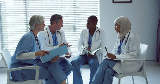 Diverse Group of Medical Professionals Having Meeting in Hospital - Download Free Stock Images Pikwizard.com