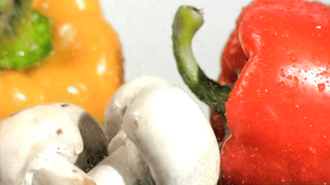 Fresh Vegetables with Water Droplets in Slow Motion