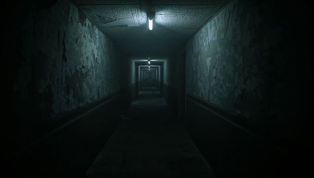 Derelict narrow corridor receding into dark with peeling paint and flickering fluorescents