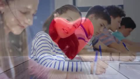 Teen Girl Smiling While Writing in Classroom with Pulsing Red Heart Overlay