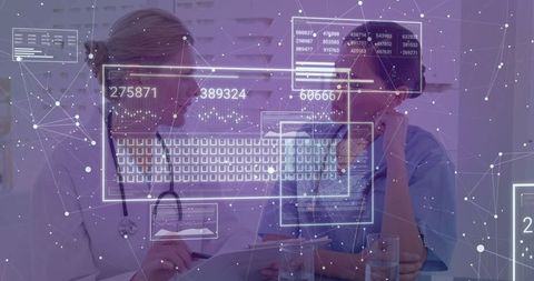 Medical Experts Analyzing Digital Data Interface in Hospital