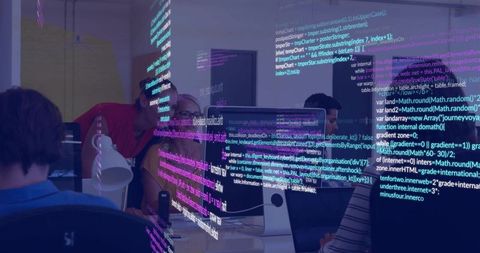 Collaborating developers reviewing neon code overlay on iMac in open office workspace