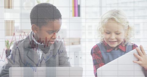 Diverse Children Collaborating on Digital Financial Data at Office