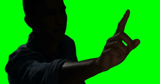 Silhouette Pointing Finger on Green Background - Download Free Stock Images Pikwizard.com