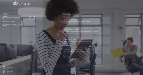 Businesswoman using ai chat bot on digital tablet in office