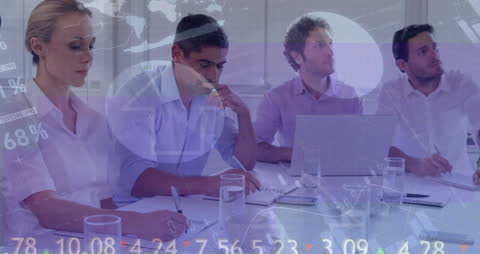 Diverse Business Team Analyzing Global Data Trends in Meeting