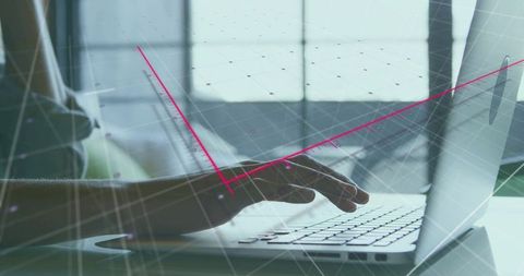 Typing on laptop with digital grid overlay conveying data analysis, connectivity, remote work