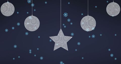 Elegant christmas ornaments with snowflakes on dark background