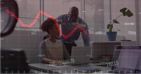 Business Team Analyzing Data Trends in Modern Office Setting