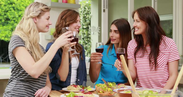 Group of Happy Friends Toasting with Wine at Home - Download Free Stock Images Pikwizard.com