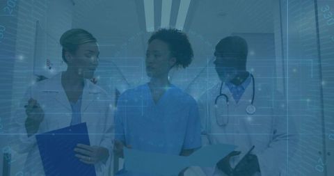 Medical Team Discussing Patient Files in Hospital Corridor