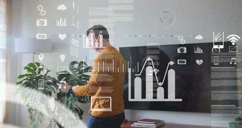 Man interacting with ar data dashboard in modern living room home office