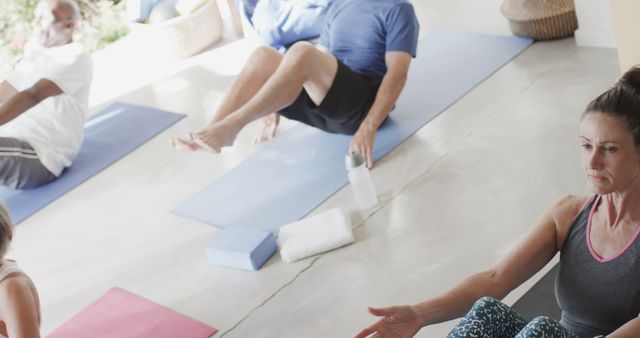 Group Practicing Yoga in Bright Indoor Studio - Download Free Stock Images Pikwizard.com