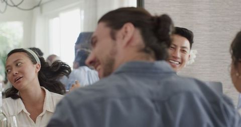 Joyful Wedding Guests Smiling During Celebration