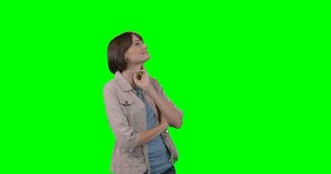 Woman Smiling and Looking Up with Green Screen Background - Download Free Stock Images Pikwizard.com