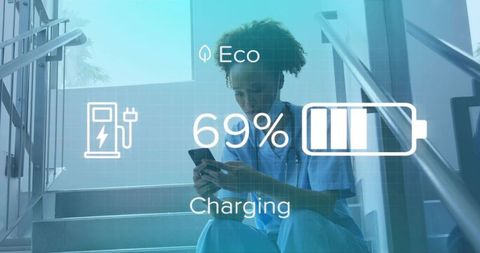 Healthcare Professional Using Phone with Modern Charging Interface Display