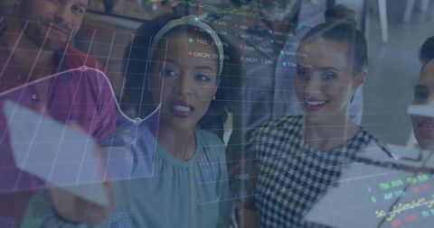 Coworkers Analyzing Digital Financial Data in Office Environment