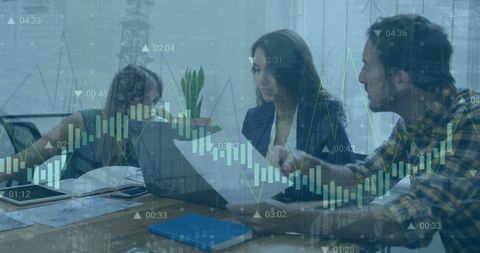 Colleagues Analyzing Financial Reports with Digital Infographic Overlay