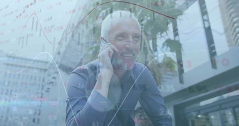 Businessman Discussing Global Finance on Smartphone with Graph Overlay - Download Free Stock Images Pikwizard.com