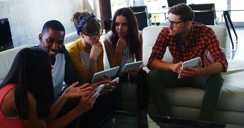 Diverse Young Adults Collaborate Using Tablets in Creative Discussion - Download Free Stock Images Pikwizard.com