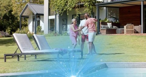 Sunlit backyard reunion: multigenerational friends hugging poolside at modern home patio