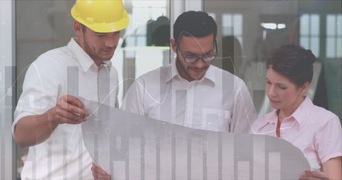 Architects Collaborating with Building Plans in Modern Office - Download Free Stock Images Pikwizard.com