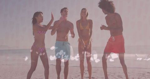 Friends Celebrating on Sunny Beach Evening