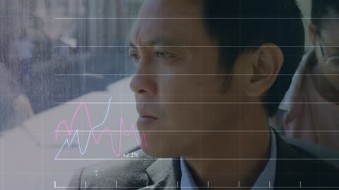 Businessman Analyzing Data through Virtual Headset