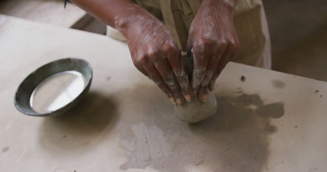 Person Shaping Clay with Hands in Pottery Workshop - Download Free Stock Images Pikwizard.com