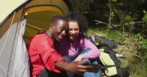 Joyful Couple Taking Selfie on Camping Adventure
