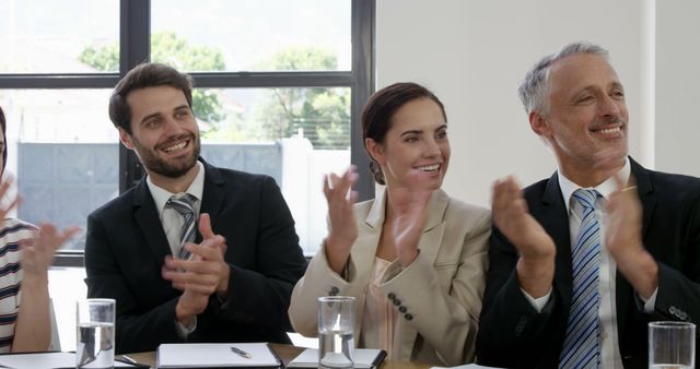 Business Team Applauding During Meeting in Office - Download Free Stock Images Pikwizard.com