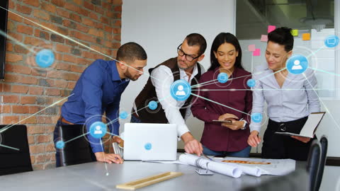 Team Collaboration with Digital Networking Icons in Modern Office