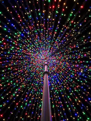 Vibrant Spiral of Multicolored Festive Lights