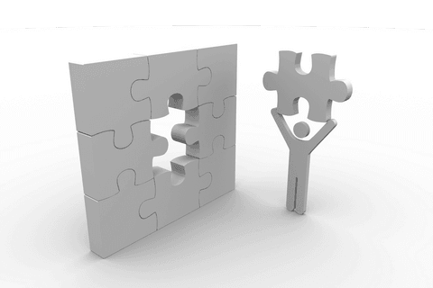 grey figure adds final puzzle piece on transparent background - Download Free Stock Videos Pikwizard.com