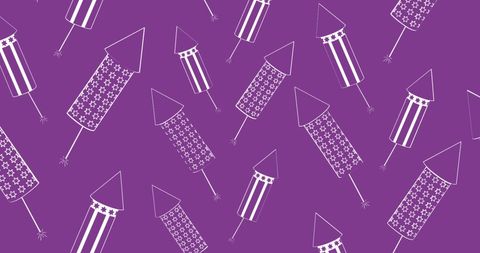 White rocket fireworks on purple background for celebrations