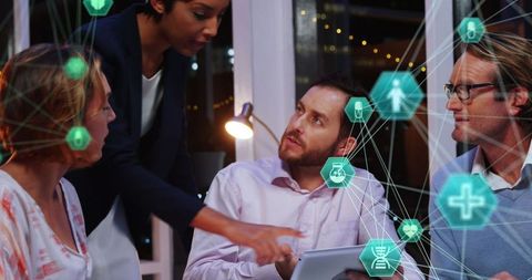 Diverse Business Team Strategizing with Digital Network Overlay