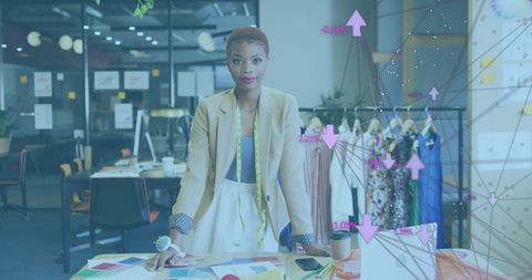 Confident Businesswoman Analyzing Trends in Modern Office