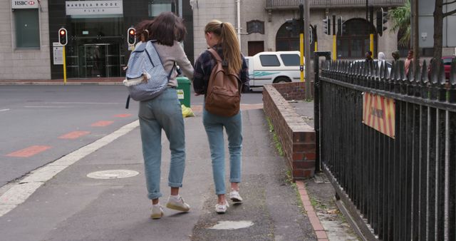 Friends Walking Together on Urban Street - Download Free Stock Images Pikwizard.com