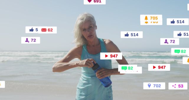 Fit Senior Woman with Social Media Notifications by the Beach - Download Free Stock Images Pikwizard.com