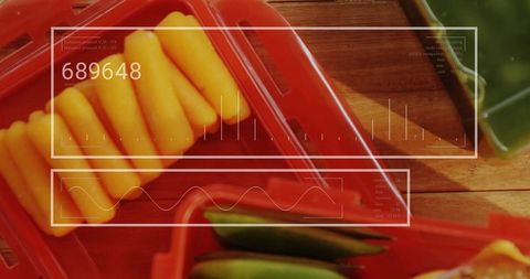 Healthy snacking with cheese sticks and okra pods in kitchen