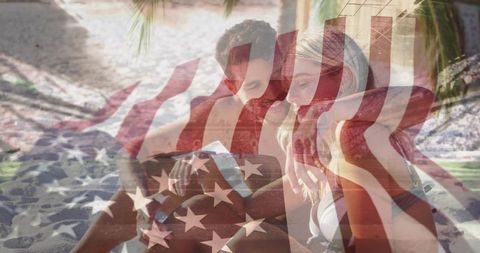 Couple enjoying tropical beach vacation with map