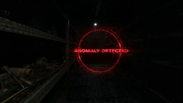 Glowing red hologram hovering in dim warehouse aisle displaying anomaly detected alert
