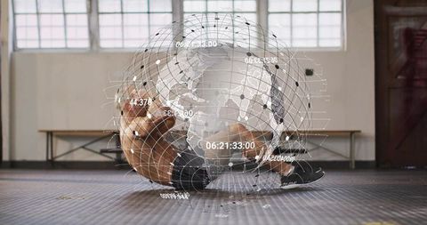 Shirtless athlete doing situps with augmented reality globe overlay in sunlit gym