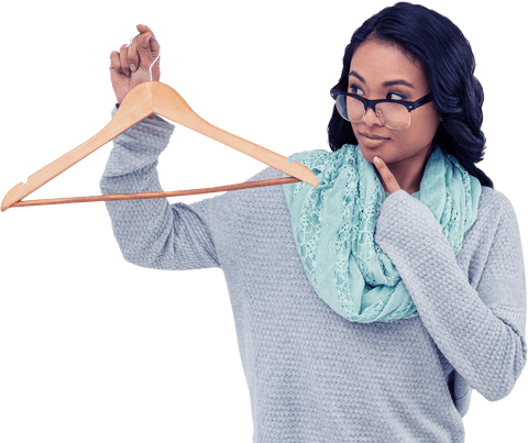 Fashion Review: Asian Woman Inspecting Transparent Wooden Hanger - Download Free Stock Videos Pikwizard.com