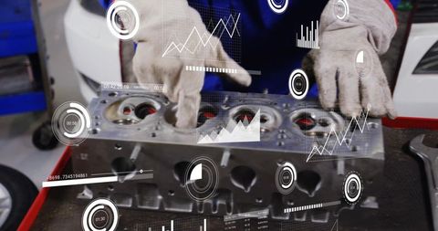 Mechanic inspecting engine cylinder head with augmented hud overlays for diagnostics