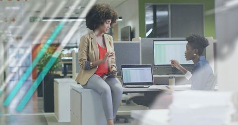 Collaboration among diverse professionals in modern office space