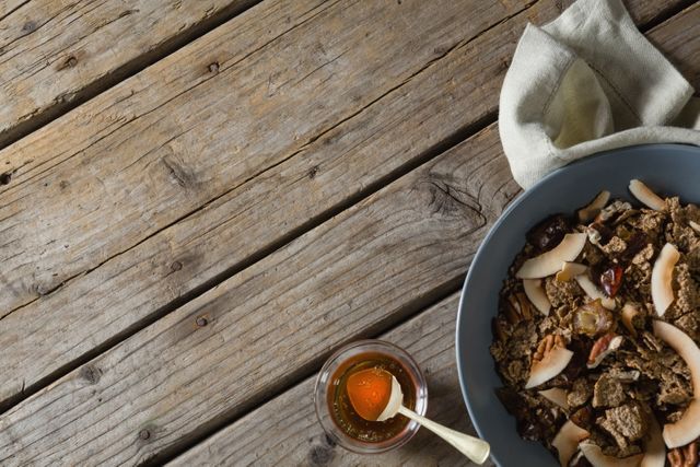 Healthy Breakfast Bowl with Honey on Rustic Wooden Table - Download Free Stock Photos Pikwizard.com