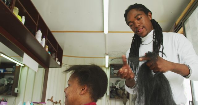 African Hair Stylist Braiding Hair in Salon - Download Free Stock Images Pikwizard.com