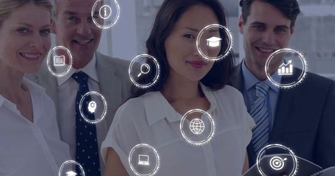 Diverse business team standing and collaborating with digital icons and analytics overlay